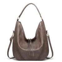 Women's Tassel Crossbody Handbag with Spacious Interior and Versatile Design